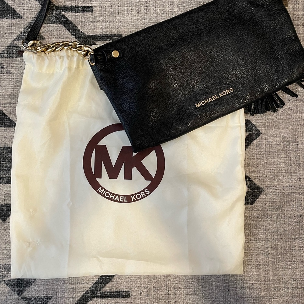 Michael Kors Black and Gold leather shoulder bag.